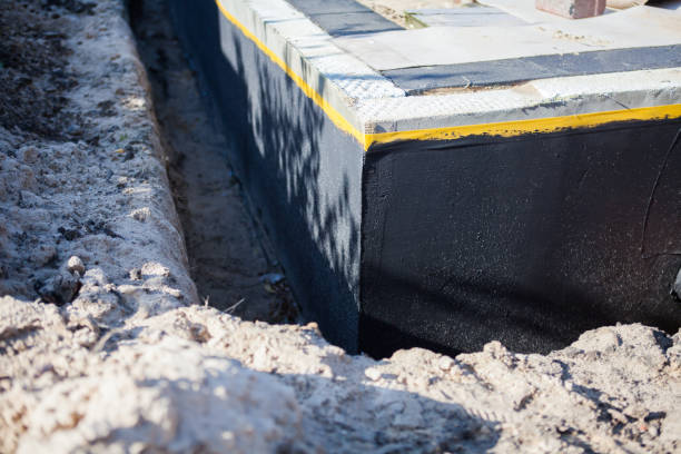Professional Emergency Waterproofing technician working in Wellington, OH